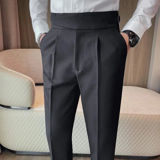 XAYWEAR black dress pants with pleats and side pockets worn with a white dress shirt