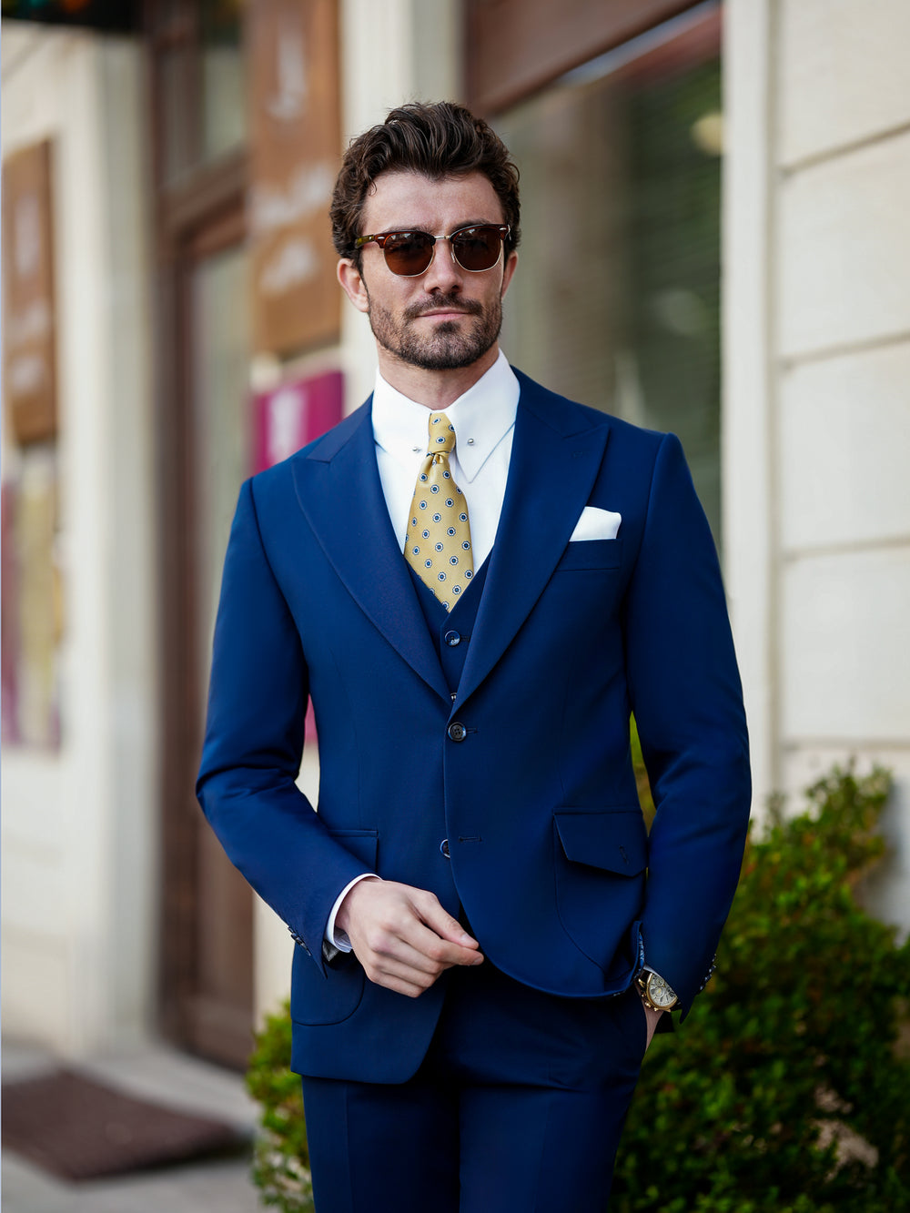 XAYWEAR navy blue suit with yellow tie and white shirt formal wear for men outdoors