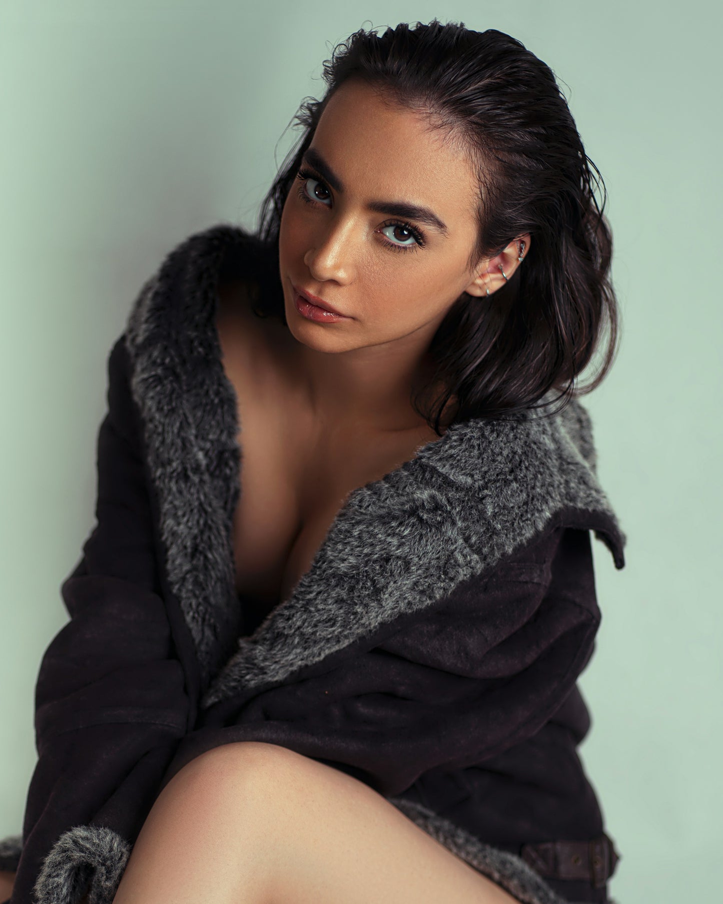 XAYWEAR winter coat for women with plush gray fur lining and cozy black exterior