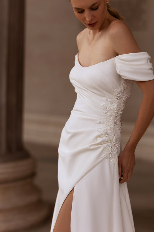 XAYWEAR elegant off shoulder white bridal gown with side slit and floral embroidery detail