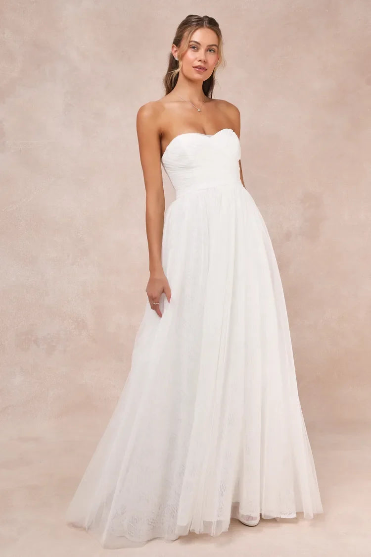 XAYWEAR strapless white bridal gown with fitted bodice and flowing skirt for weddings