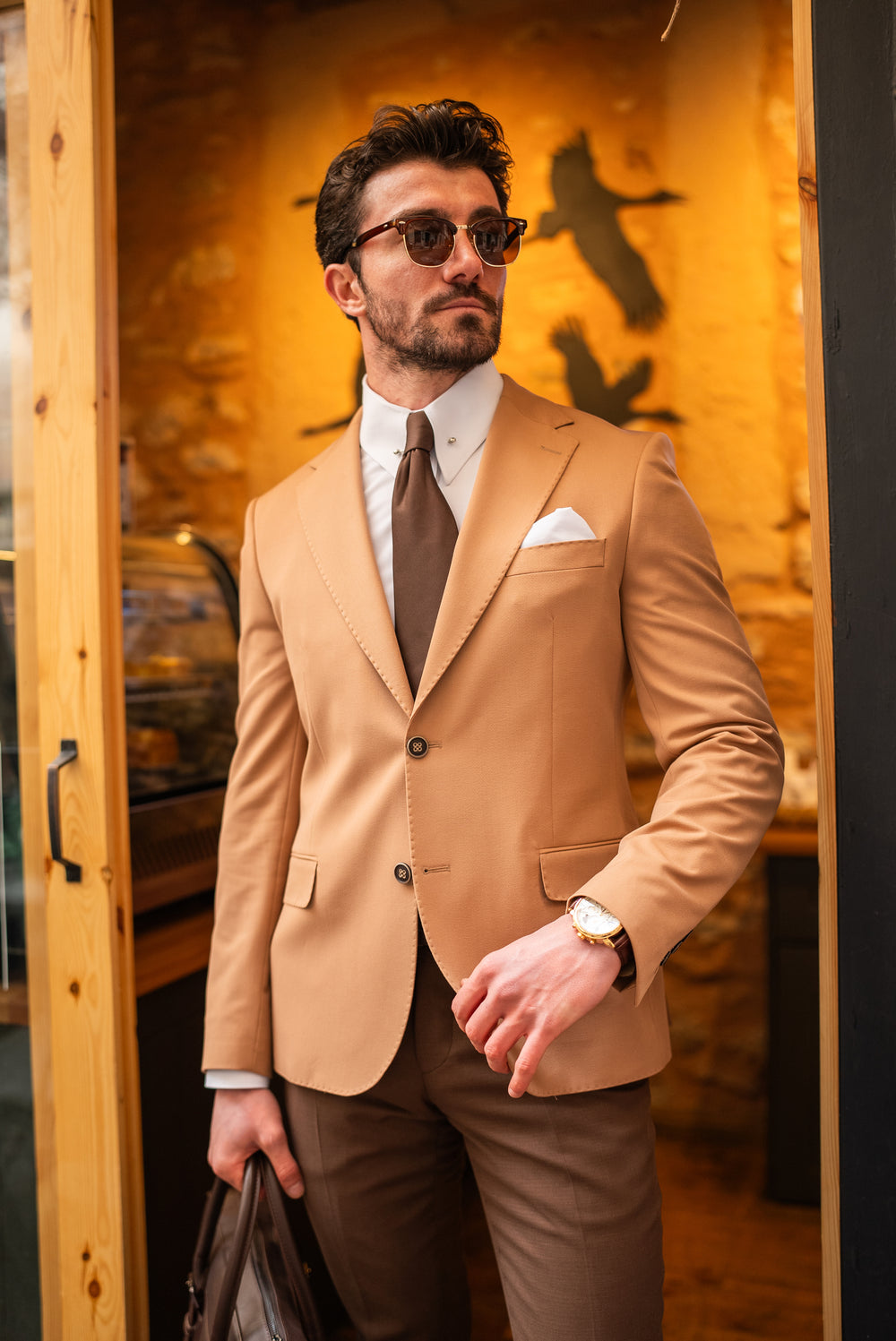 Stylish suit for men by XAYWEAR featuring a beige blazer paired with brown pants and a tie