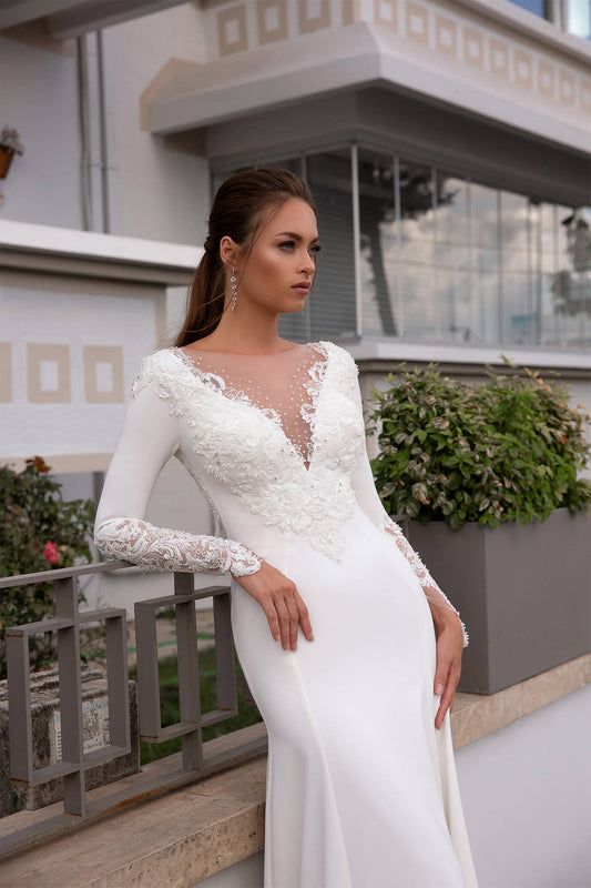 XAYWEAR elegant white bridal dress gown with lace sleeves and intricate floral detailing on bodice