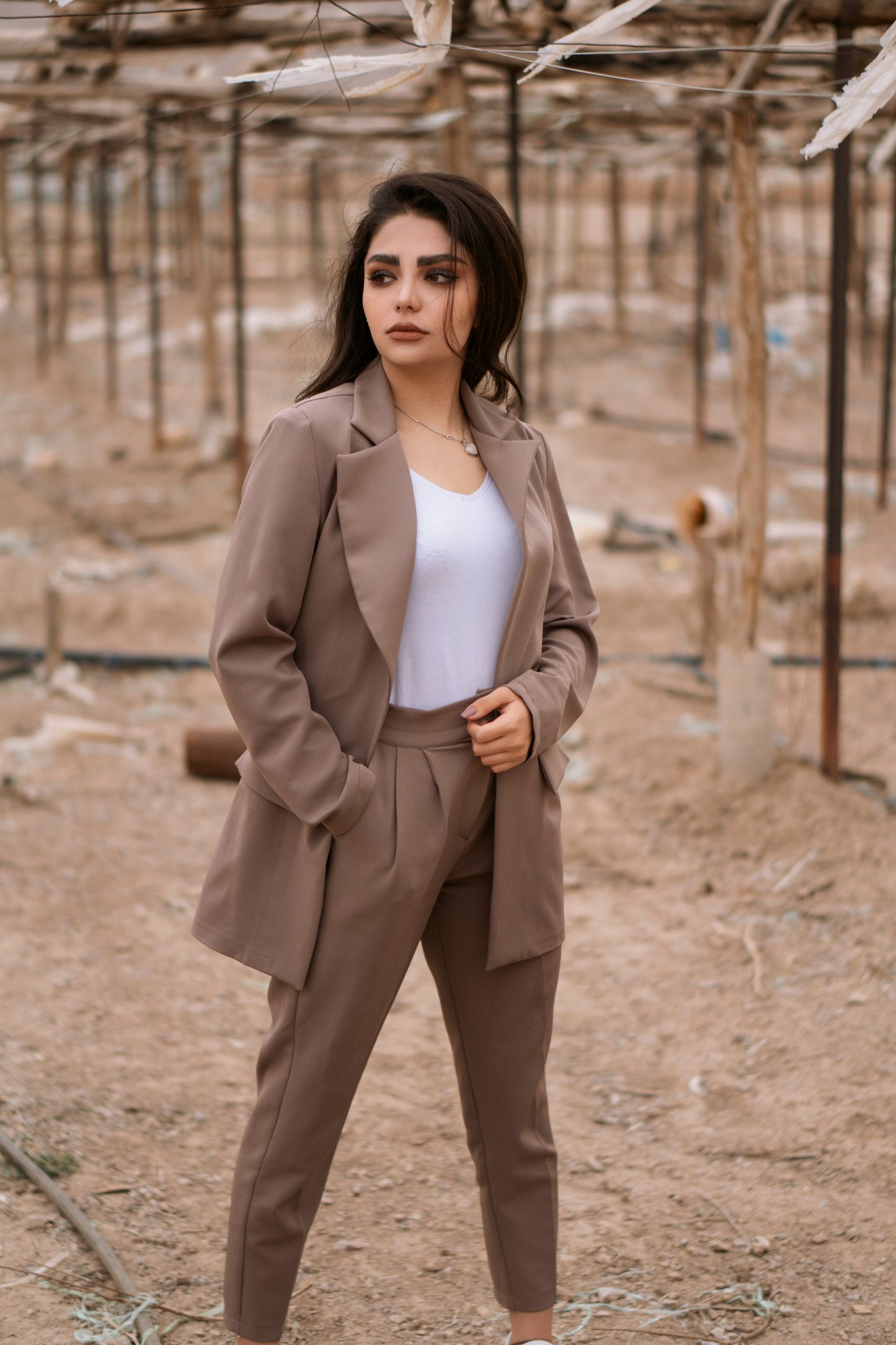 XAYWEAR elegant tan blazer and pants suit styled for a fashion-forward look in natural outdoor setting