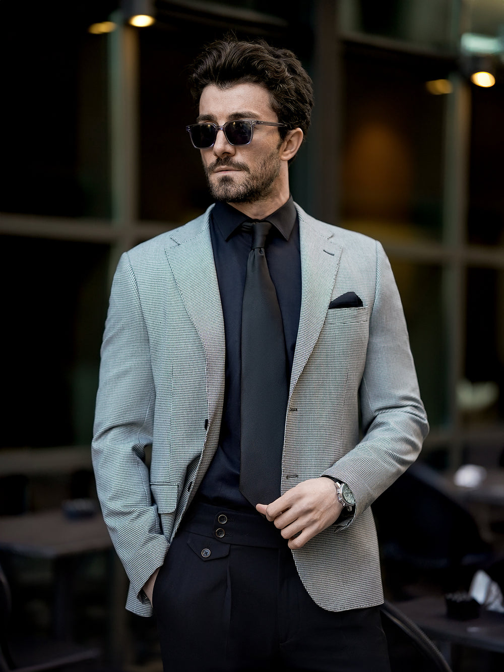XAYWEAR two piece suit for men featuring a light gray blazer and black dress pants with matching black shirt and tie