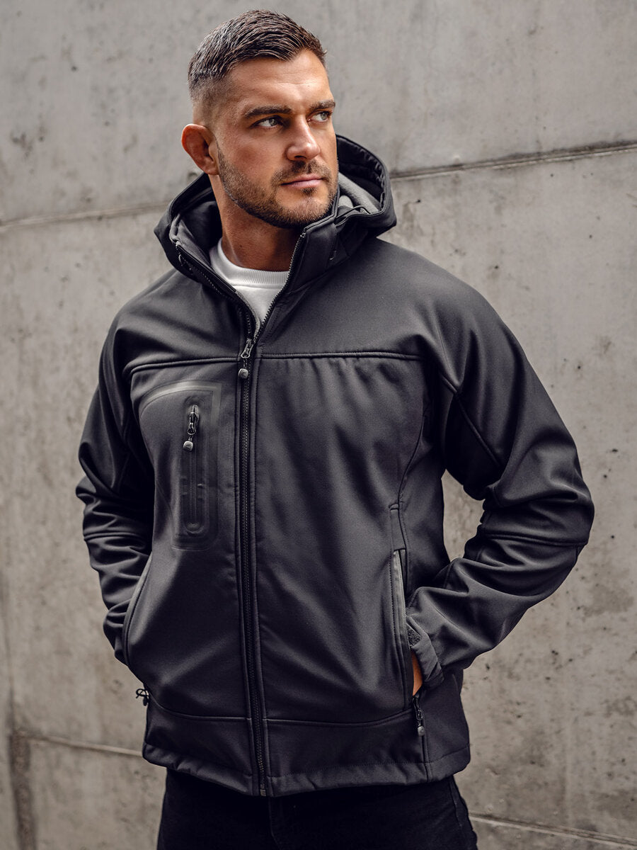 XAYWEAR men black jacket with hood and zippered pockets worn by model against concrete wall