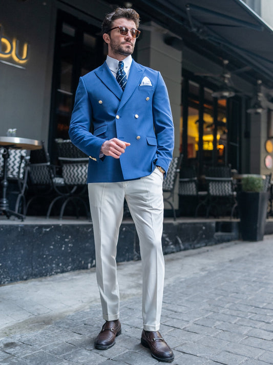 Men blazer suit by XAYWEAR featuring a blue double-breasted blazer paired with white pants and brown shoes