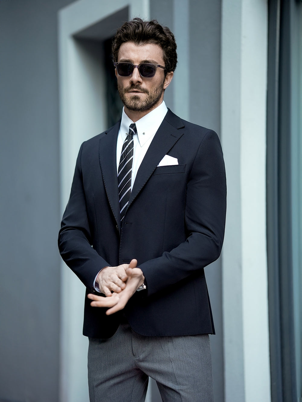 XAYWEAR elegant suit on man wearing men business attire with striped tie and sunglasses