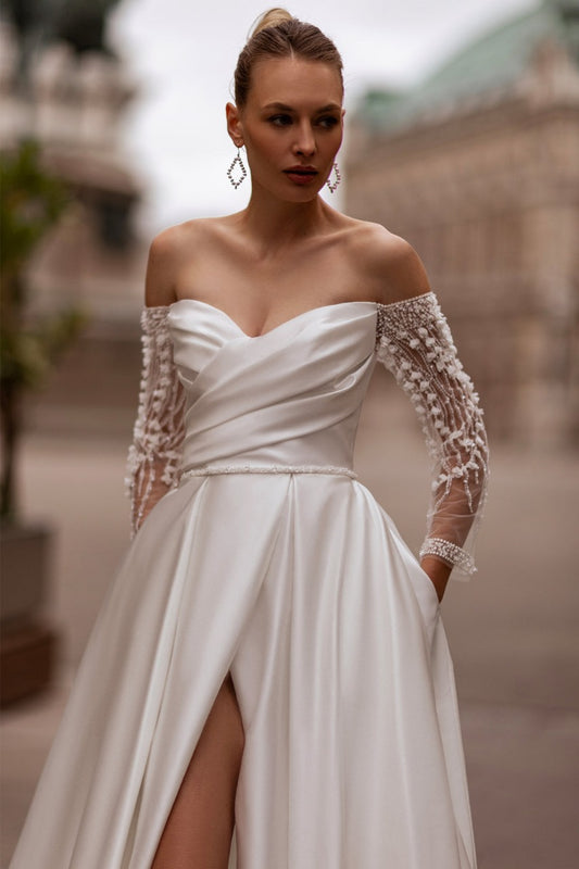 XAYWEAR elegant off shoulder wedding dress with sheer lace sleeves and satin skirt with slit