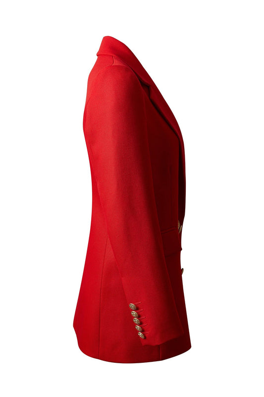 Side view of a stylish red blazer for women by XAYWEAR featuring classic tailoring and button accents