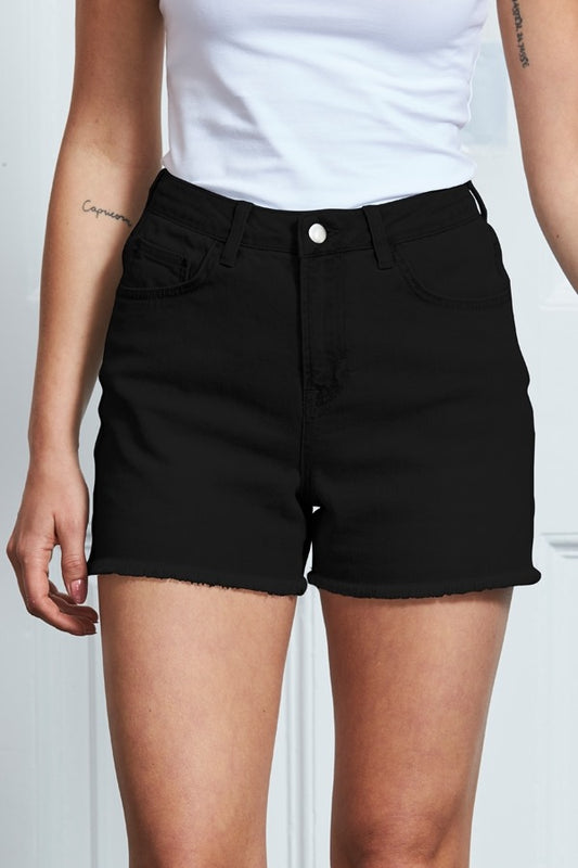 XAYWEAR black denim shorts for women with frayed hem and button closure