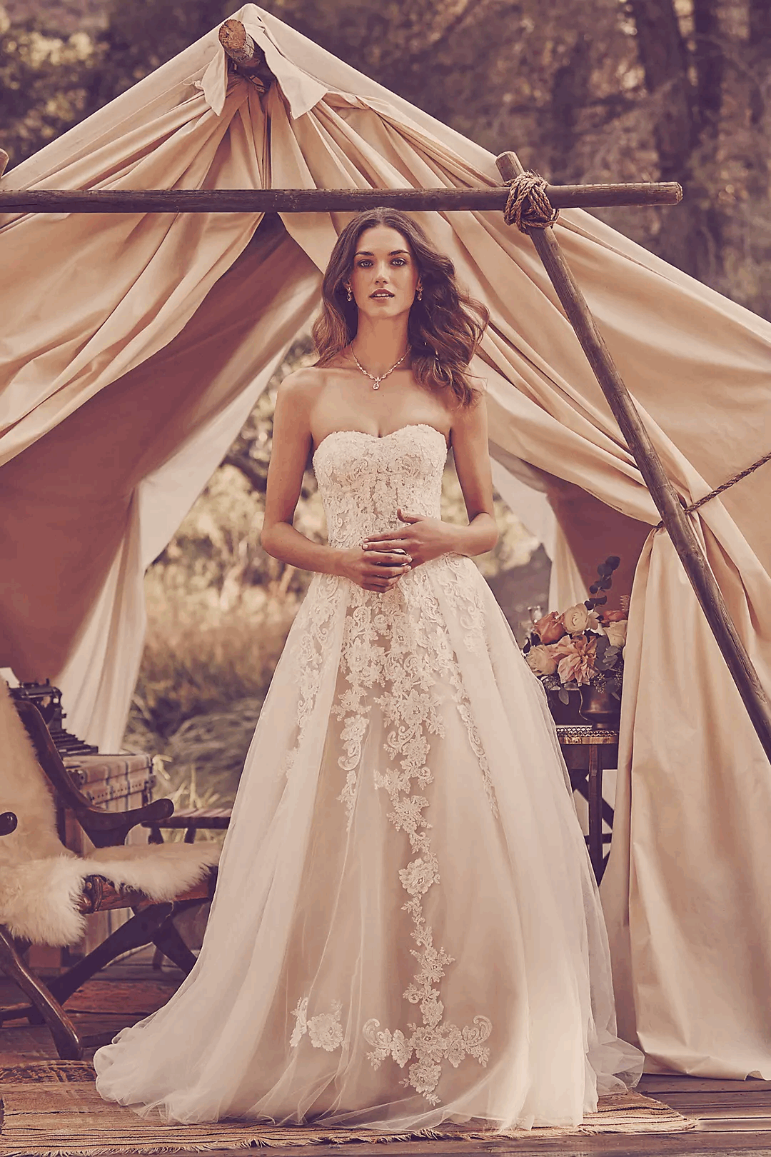 Elegant strapless lace ballgown by XAYWEAR featuring intricate lace detailing and a flowing skirt