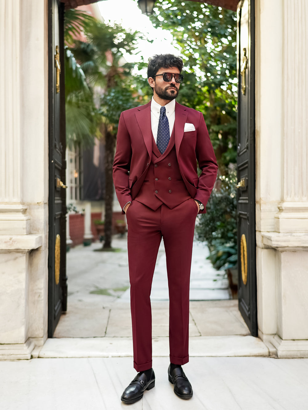 XAYWEAR burgundy suit for men with double-breasted vest, white shirt, and navy tie