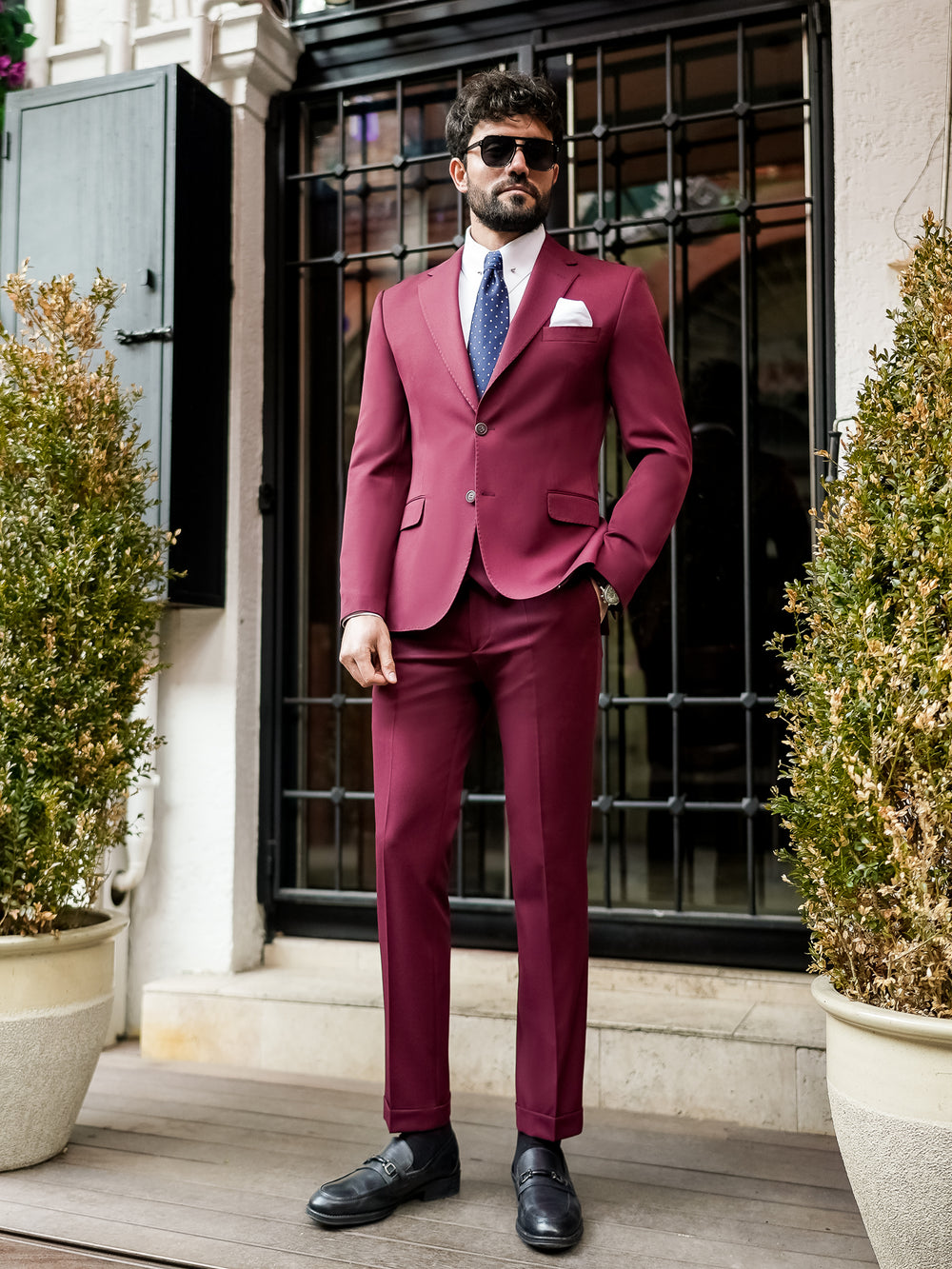 XAYWEAR stylish suit for men in burgundy with white shirt and blue tie, perfect for formal occasions