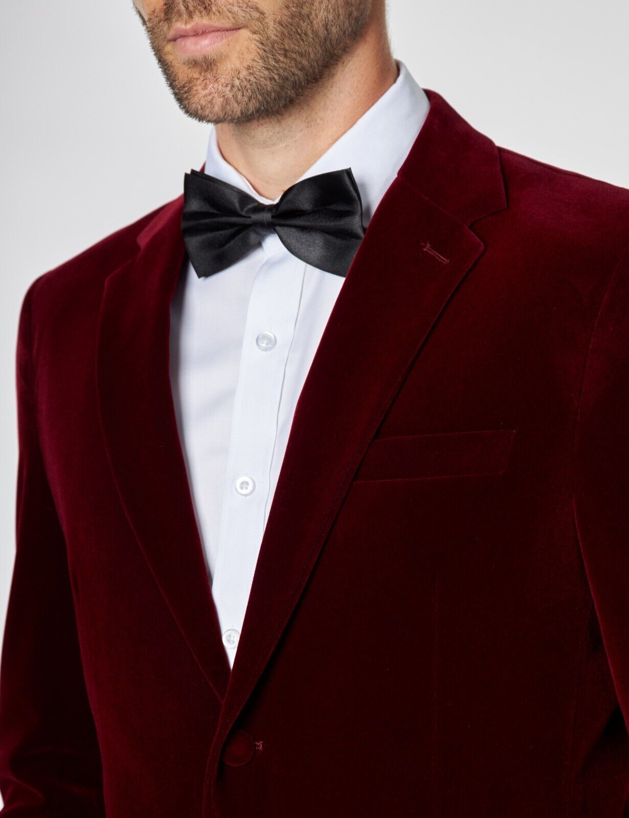 XAYWEAR burgundy velvet tuxedo for men with black bow tie and white dress shirt