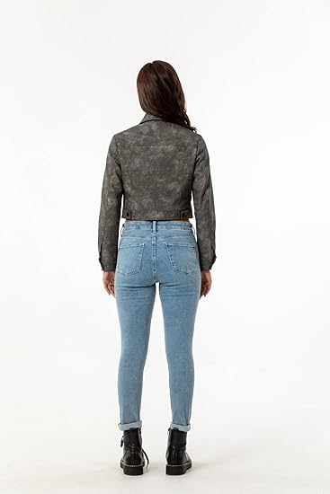 Back view of a woman wearing a gray cropped leather jacket from XAYWEAR paired with light blue jeans and black boots