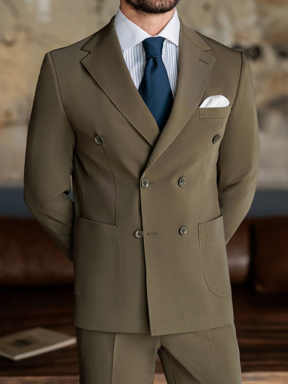 XAYWEAR olive double-breasted suit for men with white pocket square and navy tie