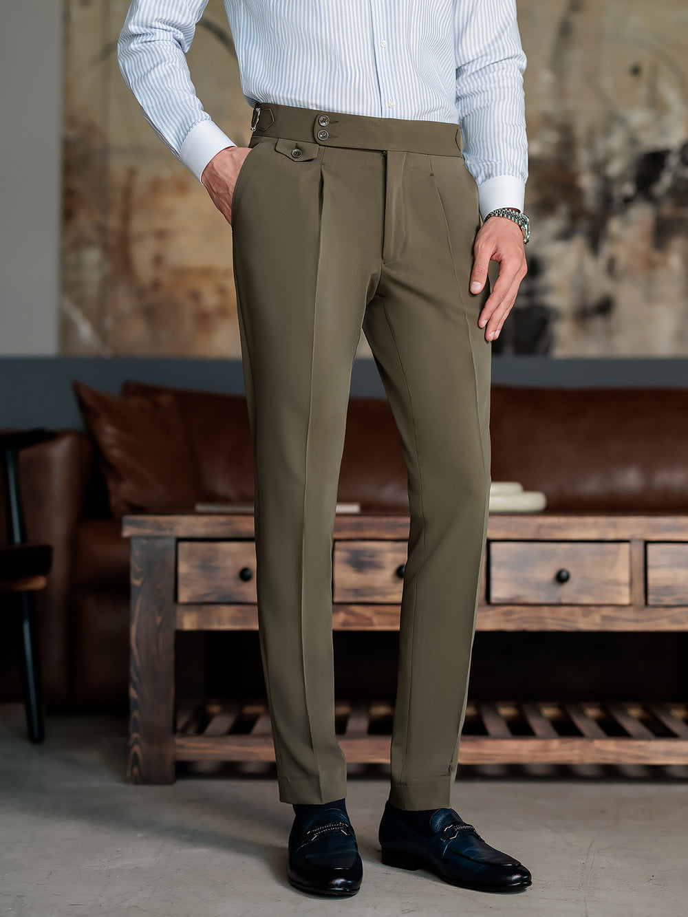 XAYWEAR olive green suit for men trousers paired with a striped white dress shirt and black dress shoes