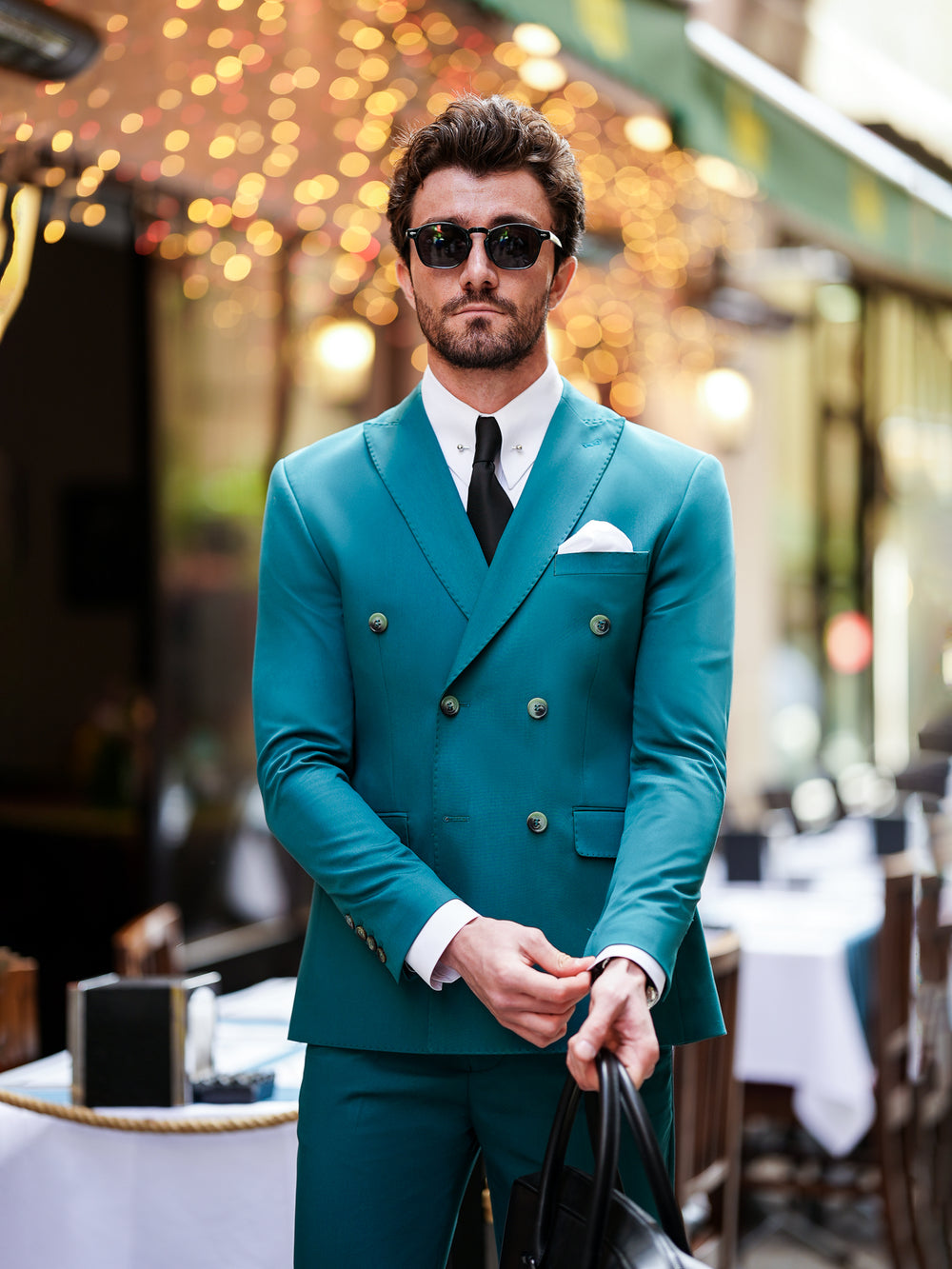 Modern teal double-breasted suit for men by XAYWEAR with black tie and white pocket square