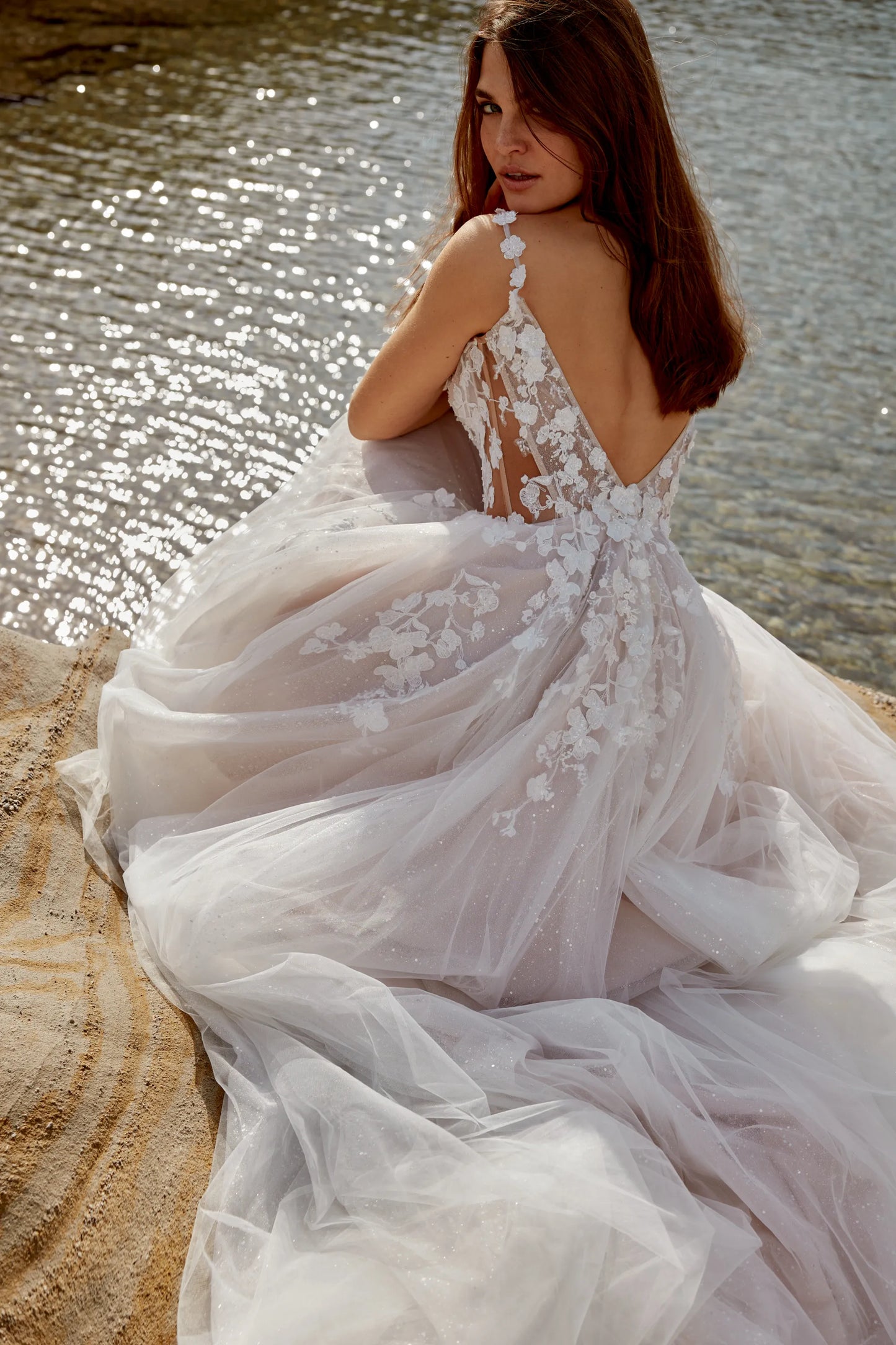 XAYWEAR elegant wedding dress gown with floral lace details and deep V back by the water