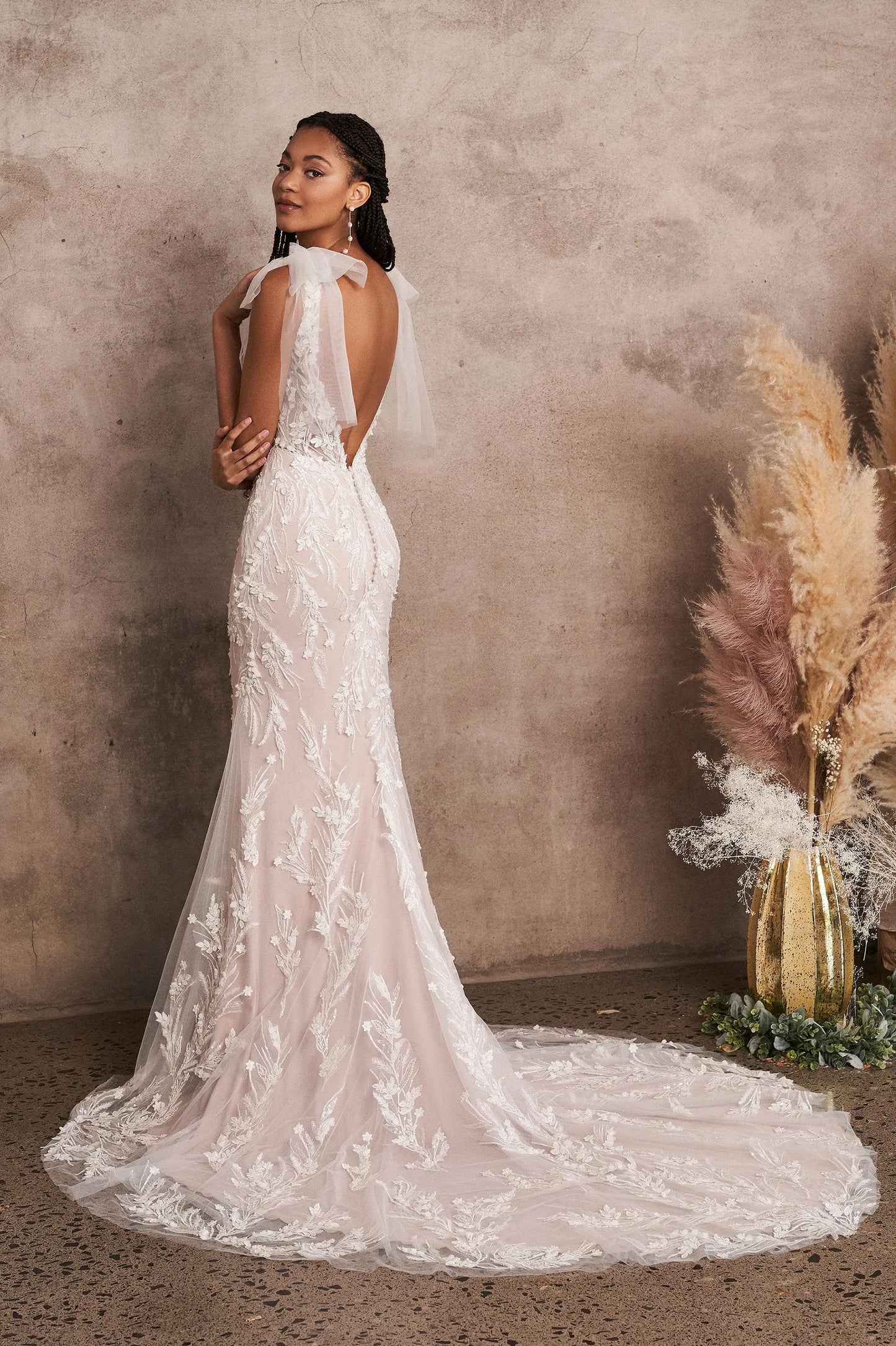 XAYWEAR wedding white dress gown with lace detailing and open back train on model