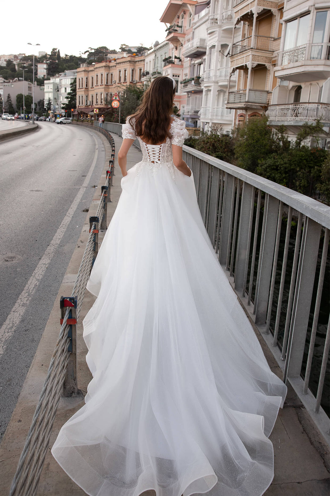 XAYWEAR elegant wedding dress gown with long flowing tulle train and lace-up back design