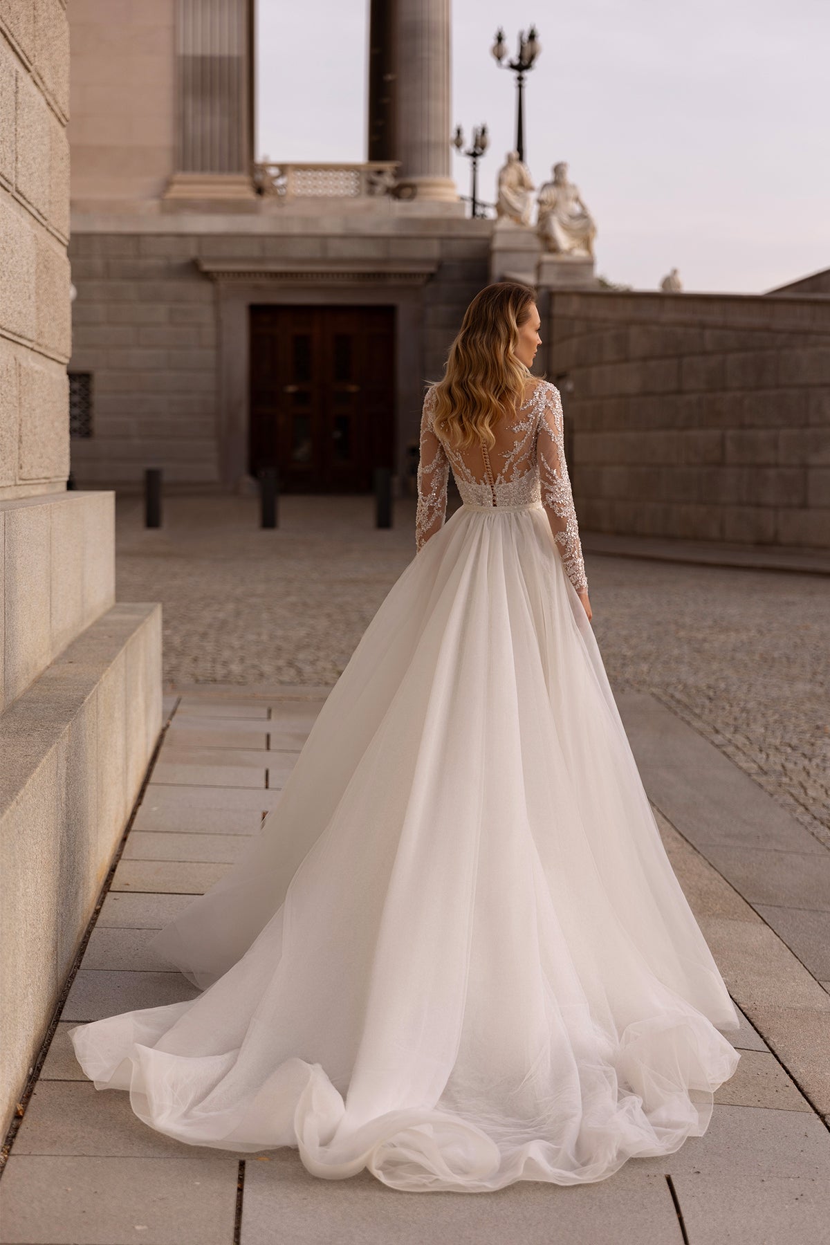 XAYWEAR long sleeve lace top wedding dress gown with flowing tulle skirt and train