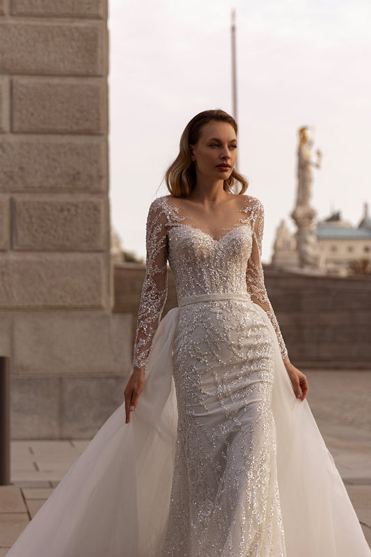 XAYWEAR elegant wedding dress with long lace sleeves and intricate beadwork on fitted gown
