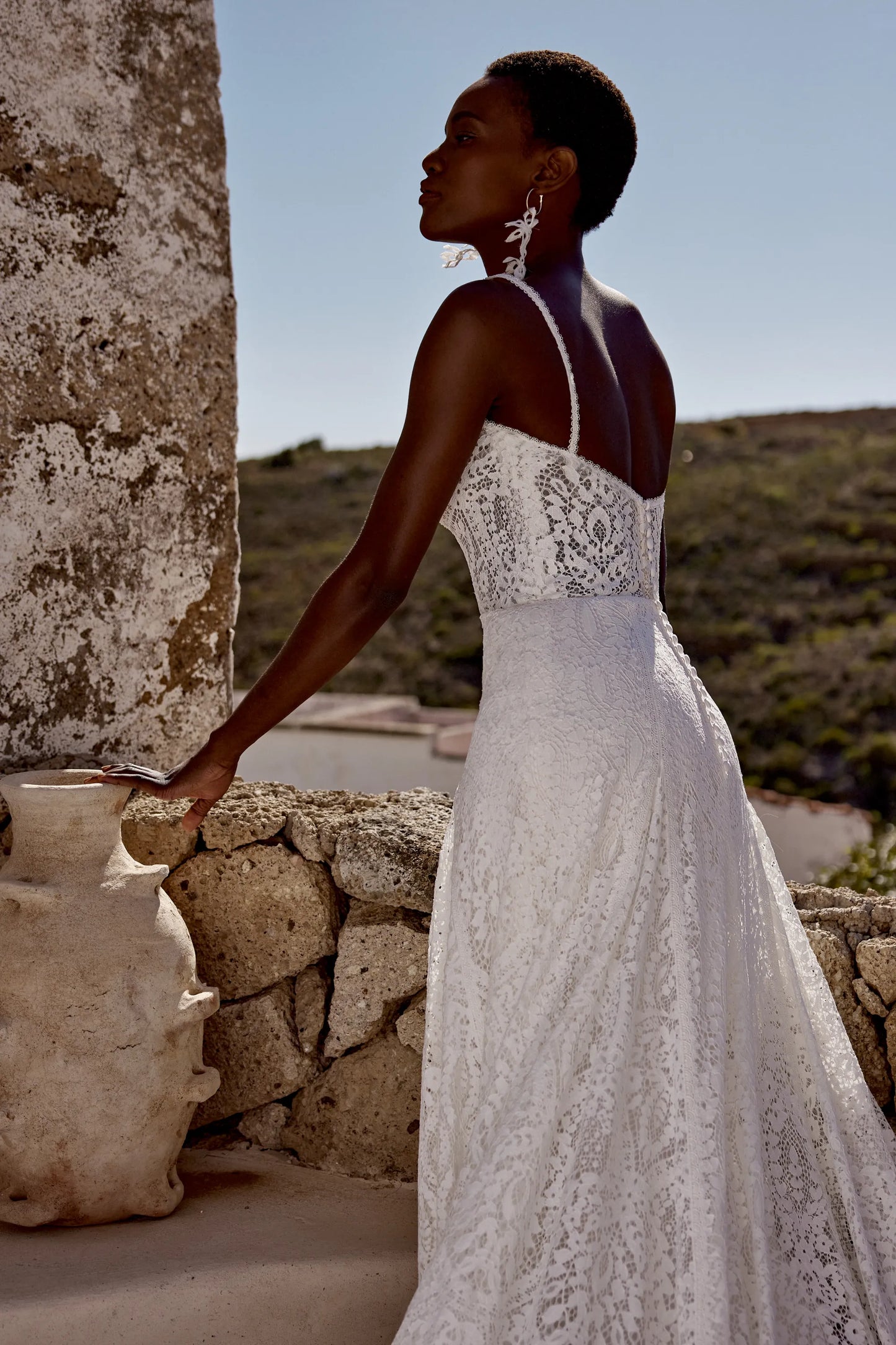 XAYWEAR elegant lace wedding gown with spaghetti straps and low back detail