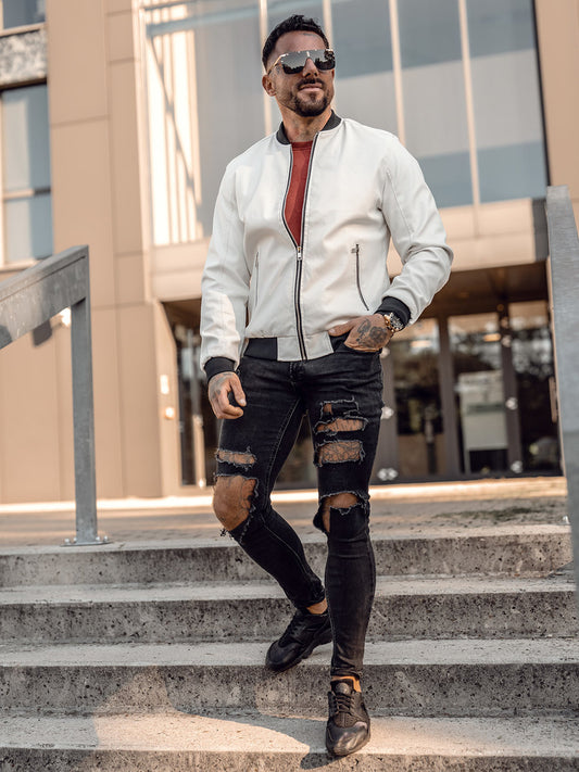 XAYWEAR white leather jacket bomber style worn by man with ripped black jeans and sunglasses