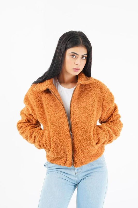 XAYWEAR women faux fur jacket in warm orange color with a zip front and relaxed fit
