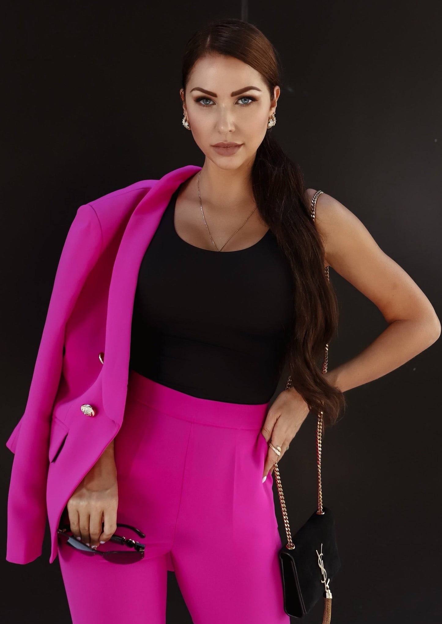 XAYWEAR bright pink suit with blazer and pants styled as women formal wear