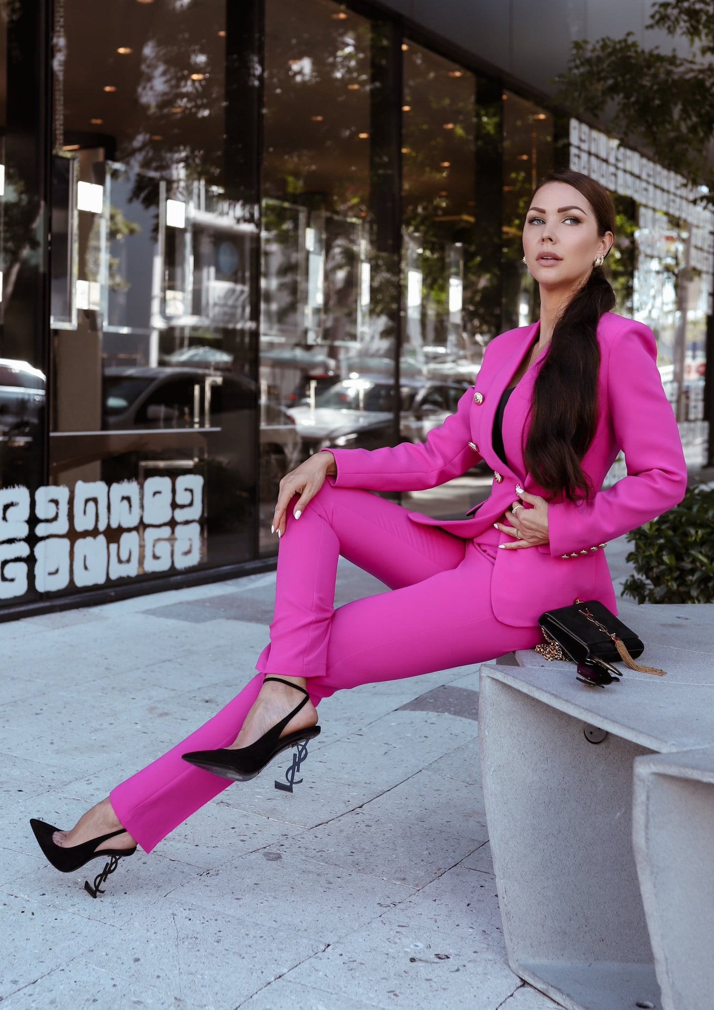 XAYWEAR bright pink women formal wear suit with fitted blazer and slim trousers styled with black heels