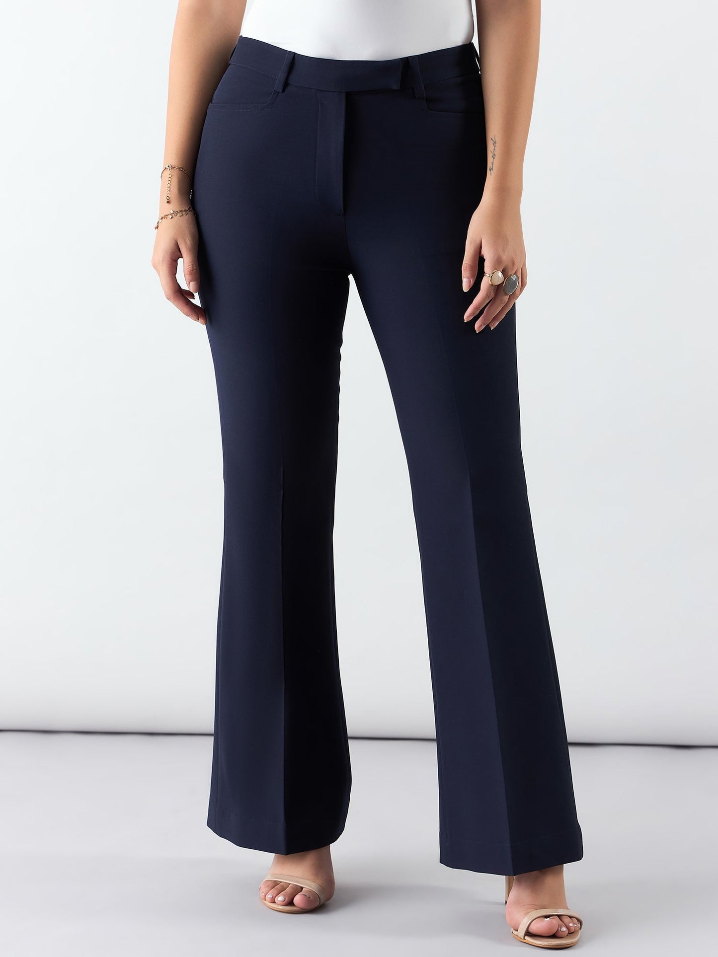 XAYWEAR women's navy blue flared trousers with a comfortable fit and stylish silhouette