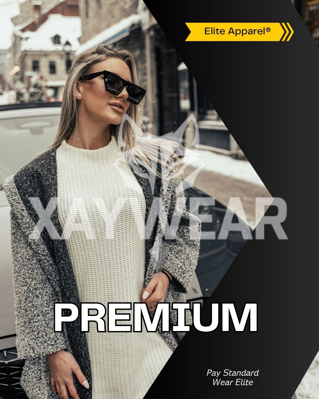 Stylish woman wearing PREMIUM cozy knit sweater and textured gray coat in urban winter setting