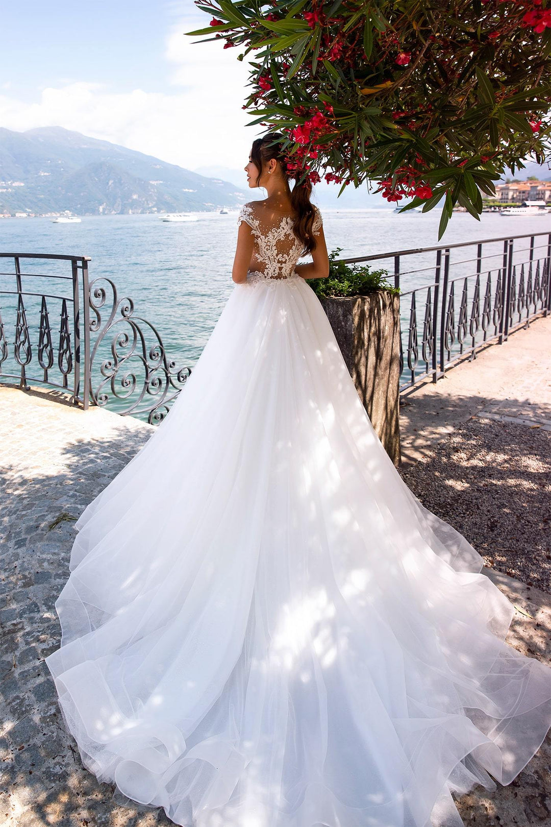 XAYWEAR ballgown wedding dress with lace back and long flowing skirt by the waterfront