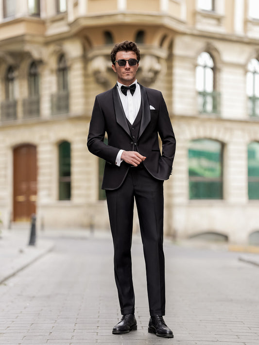 XAYWEAR black men suit with bow tie and slim fit design worn by man in stylish urban setting