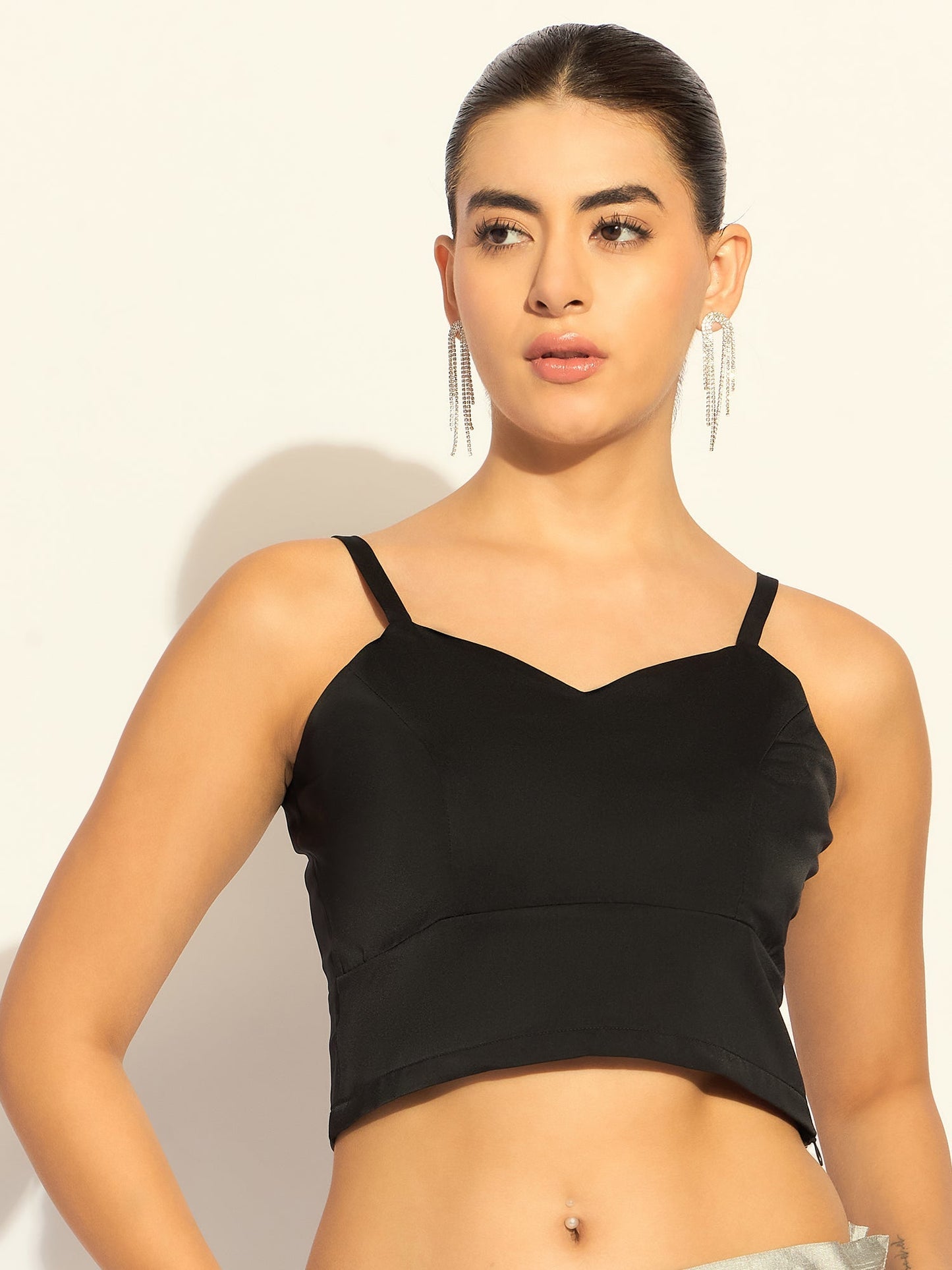 XAYWEAR black strappy crop top with a stylish design and comfortable fit for casual wear