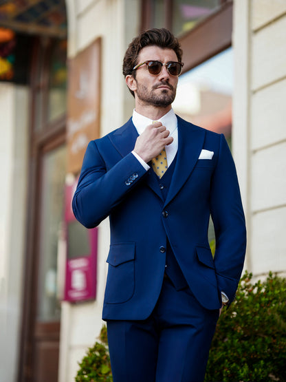 XAYWEAR navy blue suit with white shirt and yellow tie formal wear for men outdoors