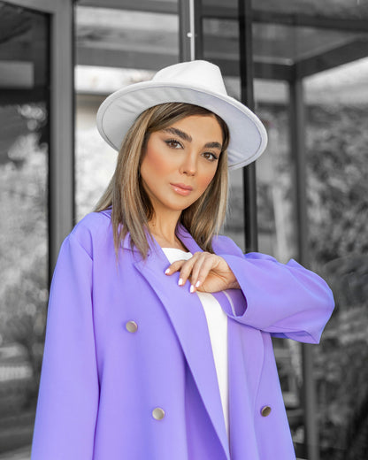 XAYWEAR women coat in lavender purple with double-breasted buttons worn by a model with white hat