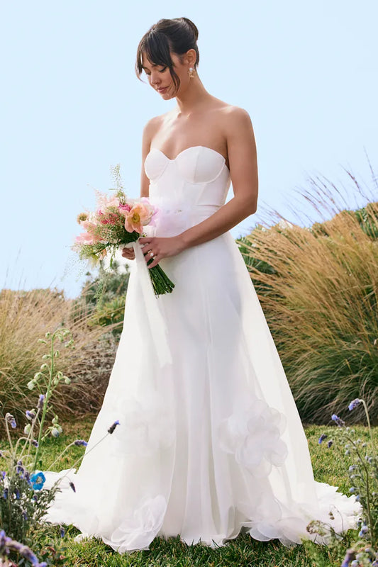 Elegant XAYWEAR A-Line Bridal Dress with a strapless design and floral accents