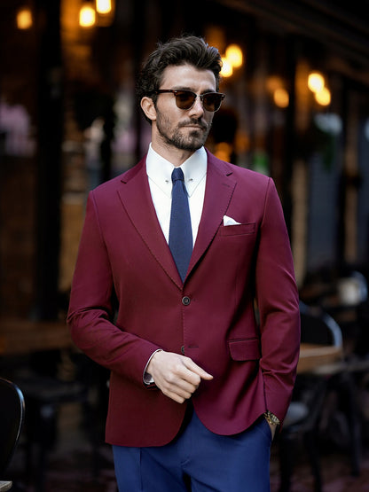 XAYWEAR burgundy blazer suit for men with white shirt and navy tie in outdoor urban setting