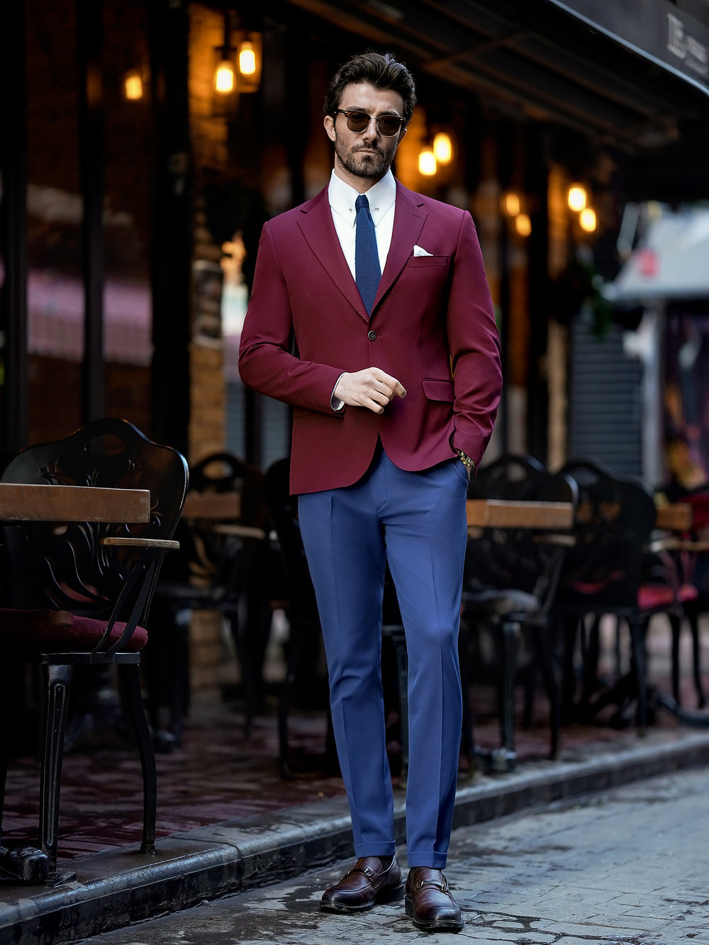 XAYWEAR burgundy blazer and blue pants suit for men styled with white shirt and brown shoes