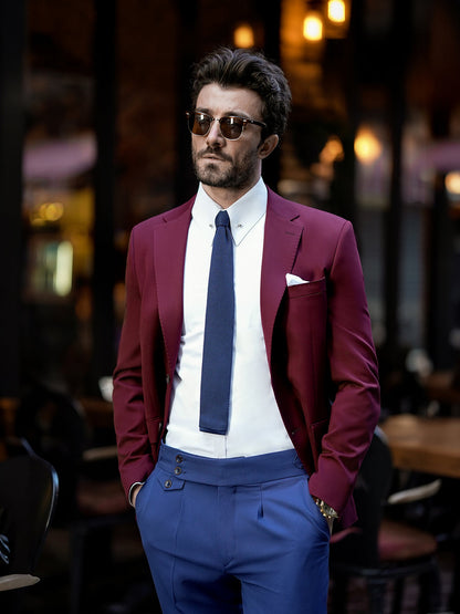 XAYWEAR suit for men featuring a burgundy blazer paired with blue trousers and a navy tie