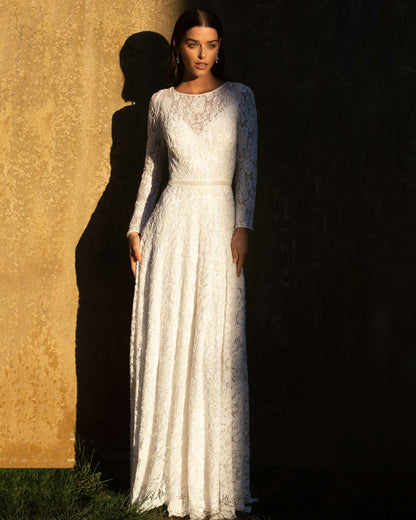 XAYWEAR elegant white bridal gown with long lace sleeves and fitted waist detail