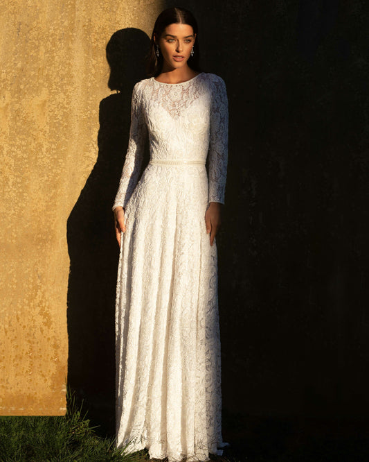 XAYWEAR elegant white bridal gown with long lace sleeves and fitted waist detail