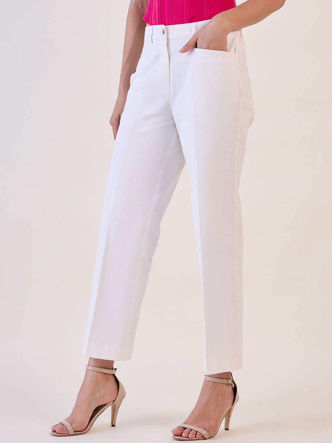 XAYWEAR elegant white tailored trousers with a sleek fit and side pockets for versatile styling