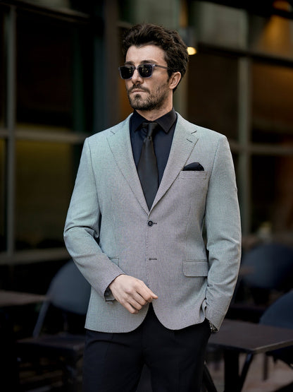 XAYWEAR stylish two piece suit for men in light gray with black shirt and tie, worn with sunglasses
