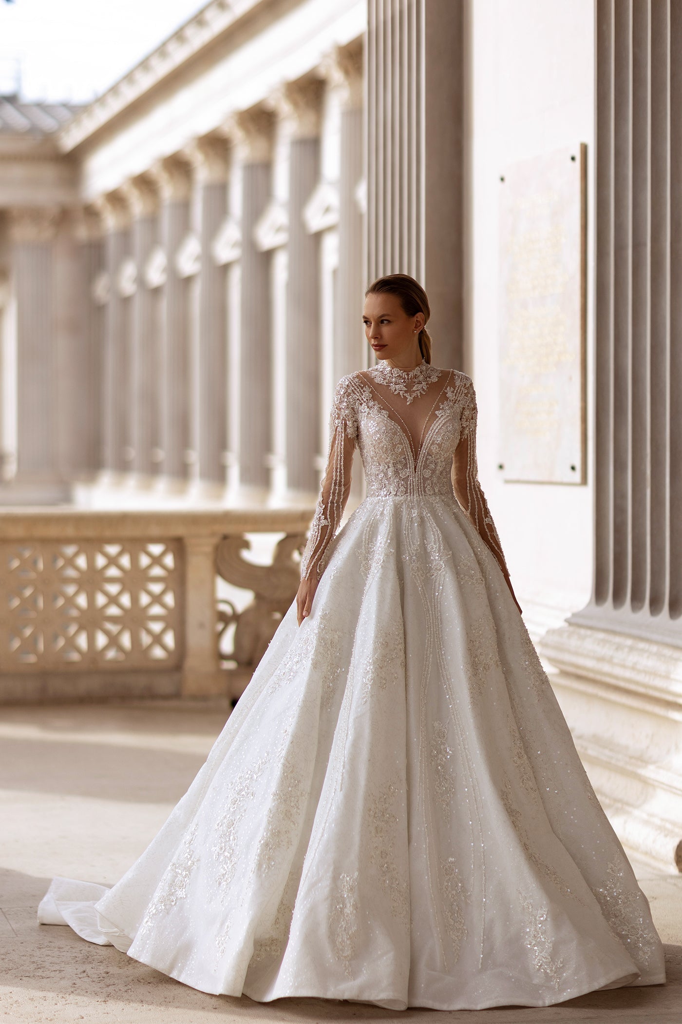 Elegant XAYWEAR high neck lace ball gown with intricate detailing and a flowing skirt