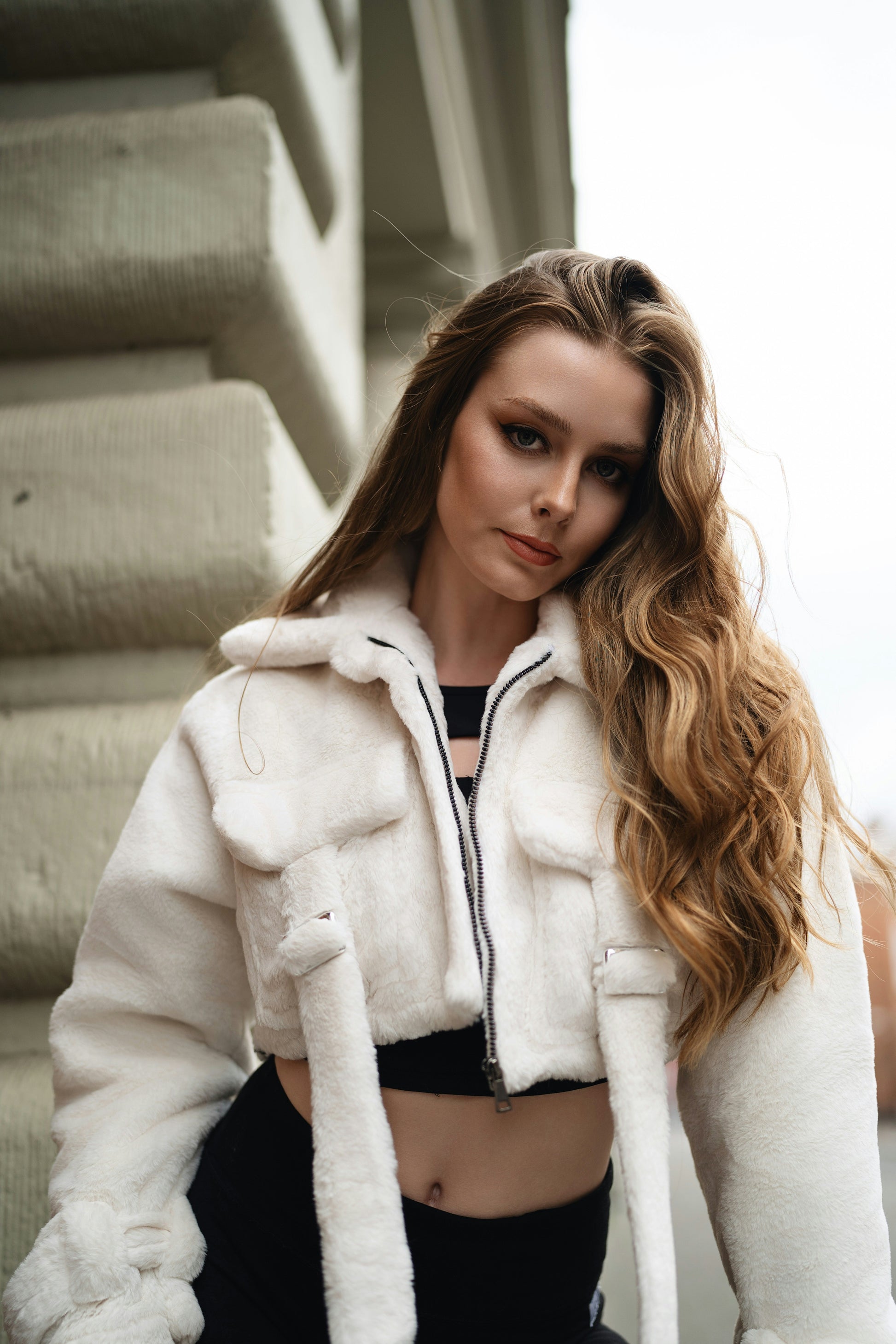 XAYWEAR ivory women jacket with front pockets and belt worn by woman with long hair
